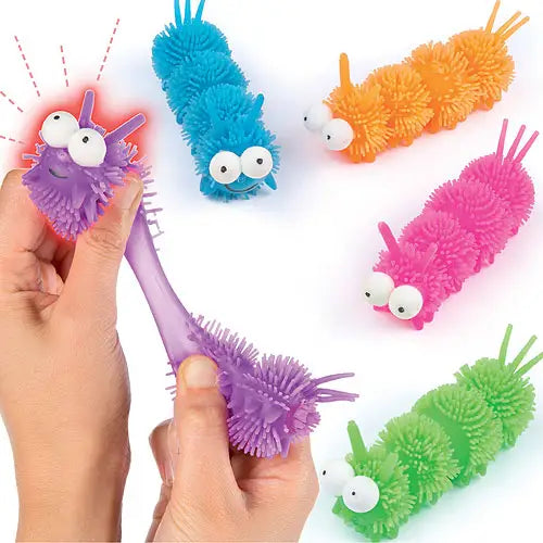 Five colorful, stretchy, fuzzy caterpillar toys. A hand pulls a purple one, making its head glow with red light.