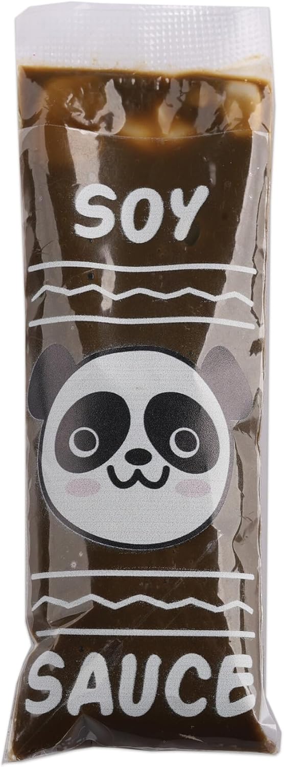 Clear toy soy sauce packet filled with dark brown liquid, featuring a cute panda face and white text.