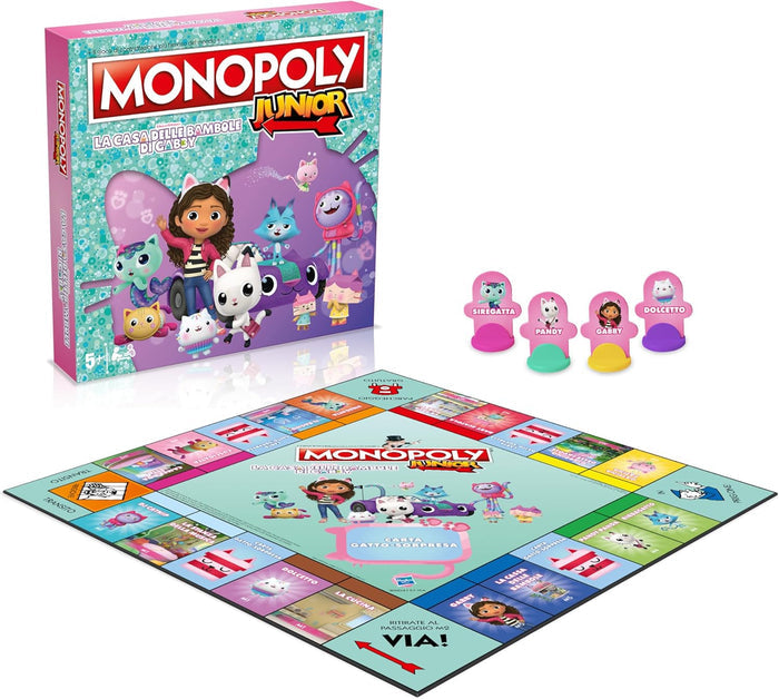 Pink Gabby's Dollhouse Monopoly Junior box next to an illustrated game board and four character standee pieces.