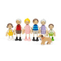Six colorful wooden family figures with posable rope limbs standing in a row next to a wooden toy dog.