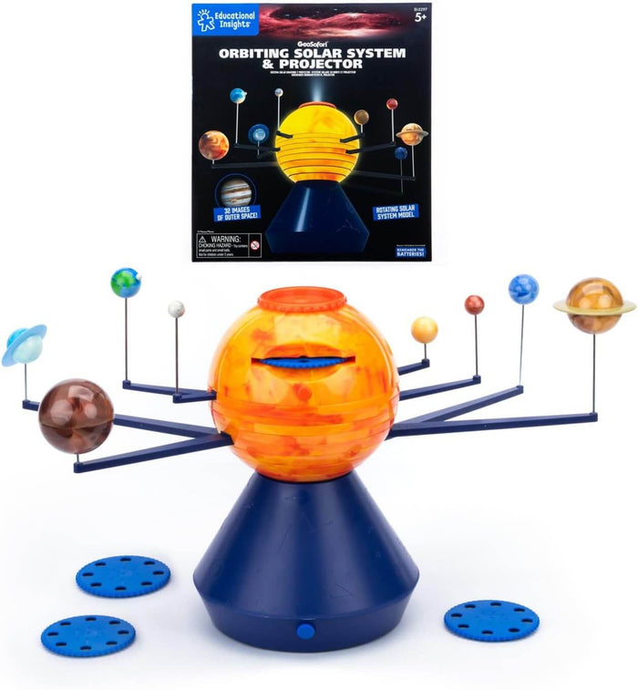 Solar system toy with a glowing orange sun, planets on blue orbiting arms, projection discs, and product packaging.