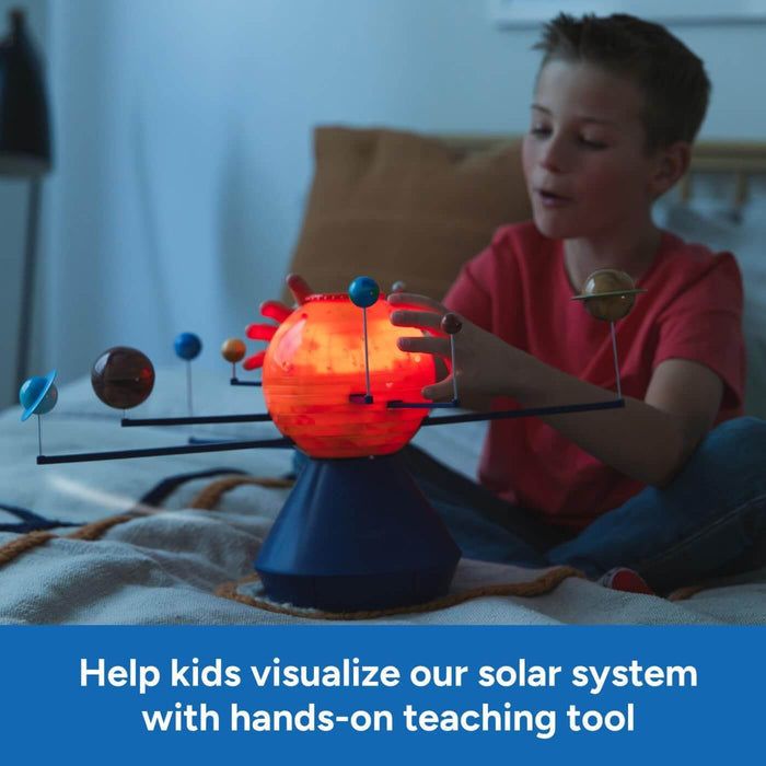 Child interacts with a solar system model featuring a glowing orange sun and planets on rotating black rods.