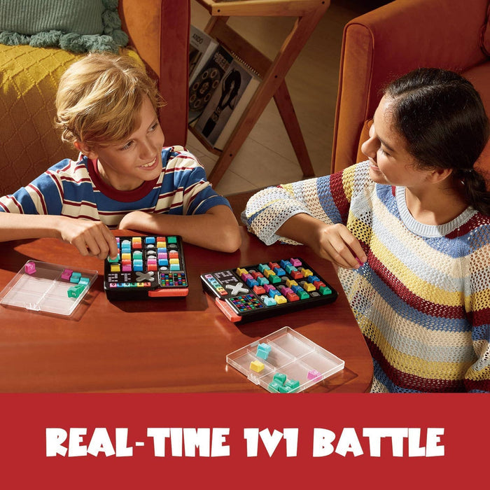 Two children play a 1v1 battle using handheld electronic grid games with colorful square blocks.