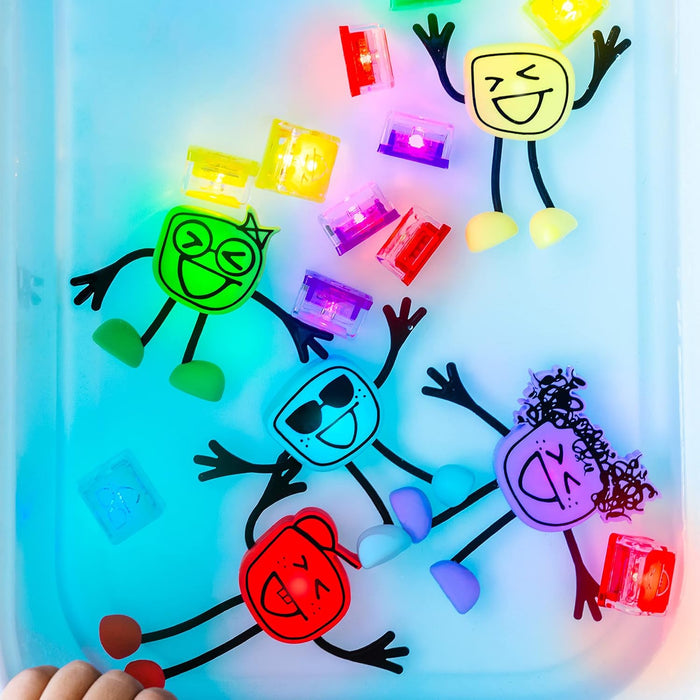 Blue character with sunglasses and a smile floating in water with other colorful characters and light-up cubes.