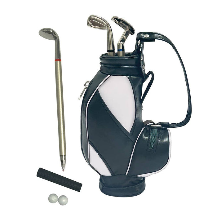 Miniature dark green and white golf bag with three golf club pens, two small golf balls, and a black flagstick.
