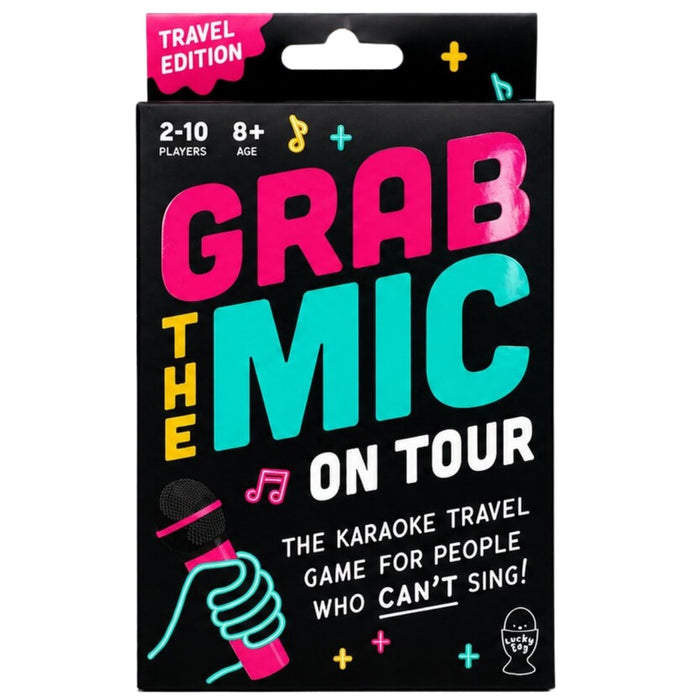 Front of the 'Grab the Mic' Travel Edition board game packaging, featuring a black background with vibrant pink, teal, and white typography, and a cartoon hand holding a microphone.