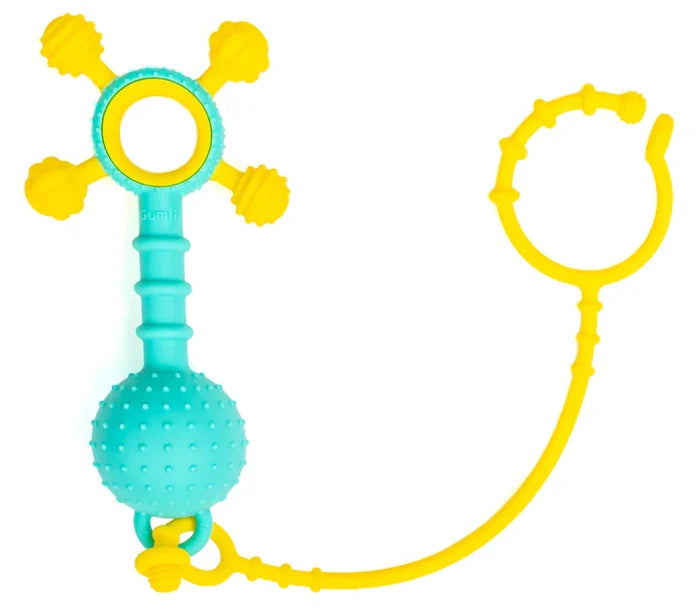 Teal baby sensory toy with a textured ball, ridged handle, knobbed top, and a flexible yellow strap with a ring.