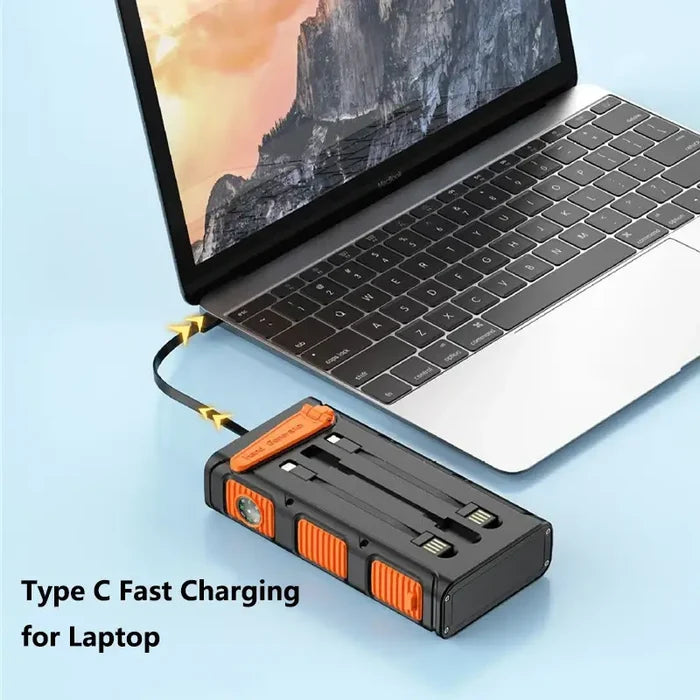 Hand Crank Solar Power Bank 30000mAh with Cable Camping Light charging a laptop via Type C fast charging