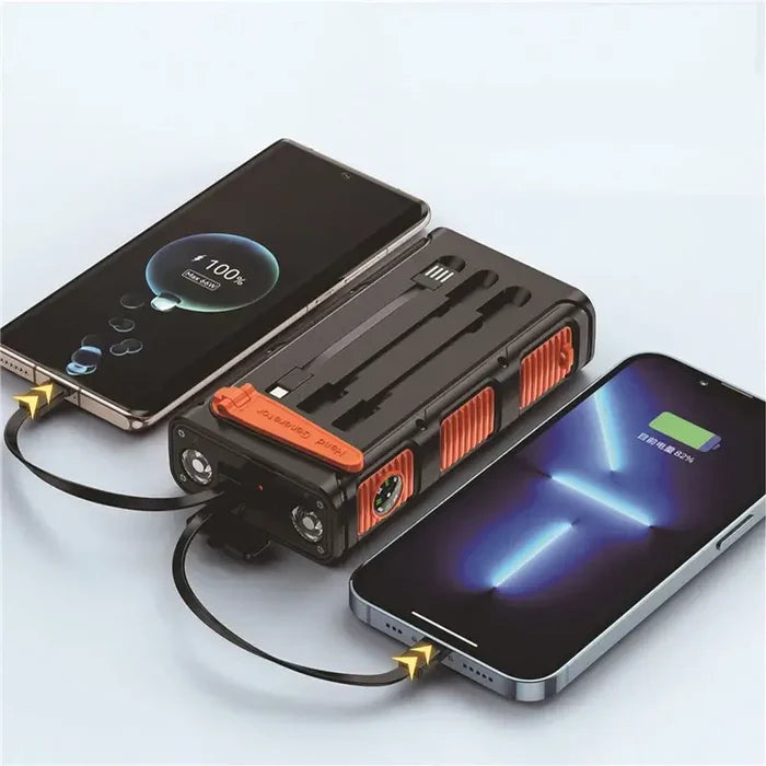 Hand Crank Solar Power Bank 30000mAh with Cable Camping Light charging two smartphones via Micro USB.