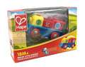 Yellow, red, and blue toy train with number 9, displayed in a cardboard box with a clear window.