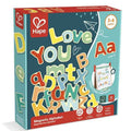 Teal box of 52 vibrant wooden magnetic letters in various colors and sizes, featuring the words Love You on the front.
