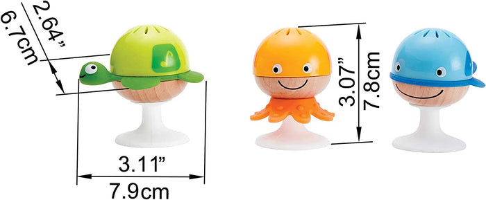 Green turtle, orange octopus, and blue whale suction rattles with wooden smiley faces and size dimensions.
