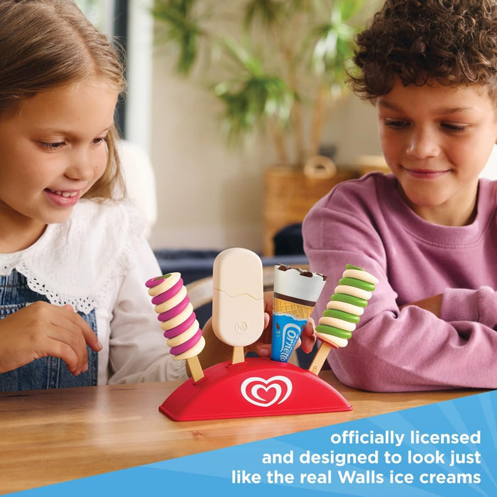 Two children playing with a red toy stand holding colorful miniature ice cream lollies and a blue Cornetto cone.