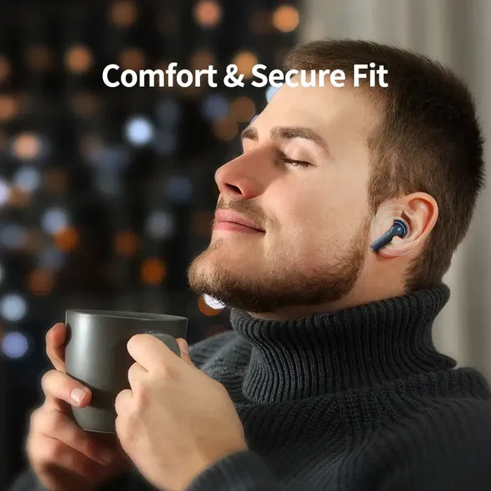 Man wearing Headphones 4-Mics ENC Call Noise Cancelling True Wireless Earbuds, enjoying comfort and secure fit, holding a mug.