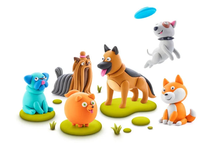 Six colorful clay dogs of various breeds, including a blue pug and jumping bull terrier, on green clay grass mounds.
