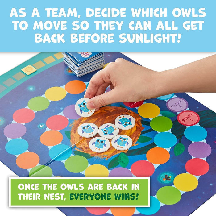Hand placing a blue owl token on a colorful circular board game path toward a center nest.