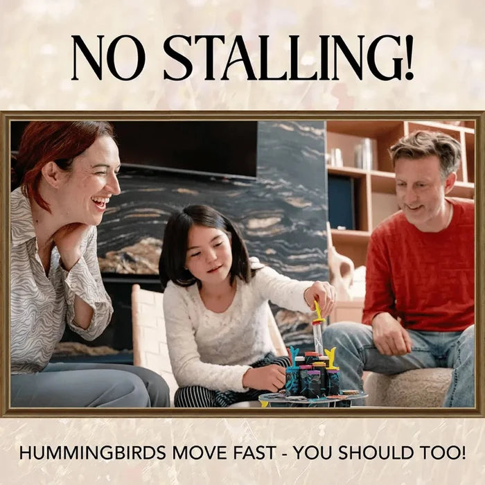 Family playing Hummingbirds with colorful tubes. Text: NO STALLING! HUMMINGBIRDS MOVE FAST - YOU SHOULD TOO!