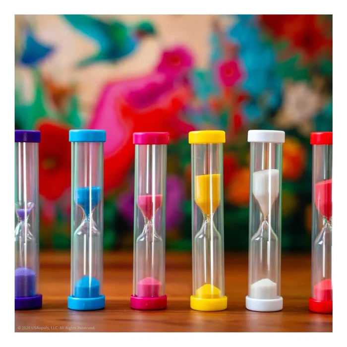 Six colorful sand timers lined up in front of a vibrant, blurred background of hummingbirds and flowers.