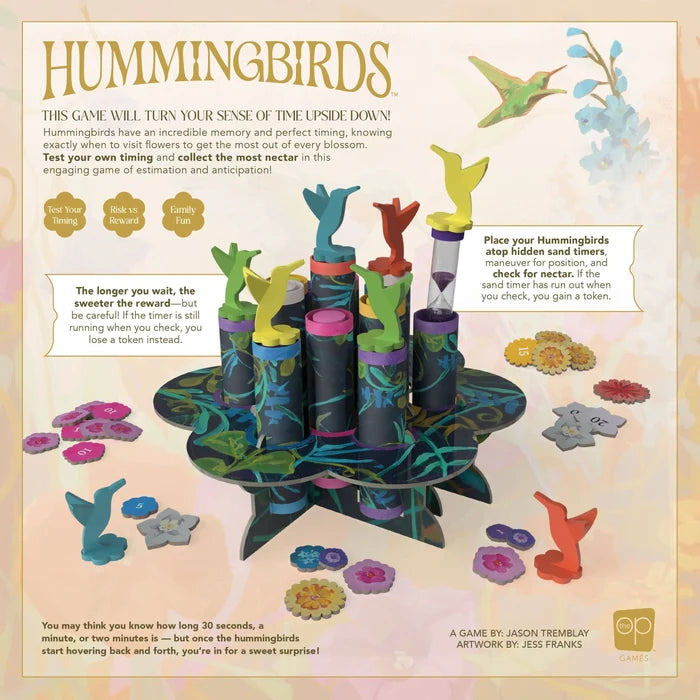 3D board game featuring colorful hummingbird figures on tall tubes, a floral stand, sand timers, and flower tokens.