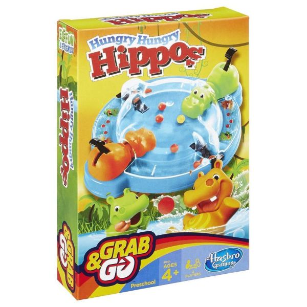Yellow box for a travel game showing a blue board with orange and green hippos and marbles under a clear plastic dome.