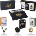 A black Huzzle 40th Anniversary gift box showing three individual metal puzzles in silver, black, and gold finishes.