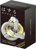 Black packaging for Huzzle Cast Cyclone showing interlocking silver and gold metal rings.