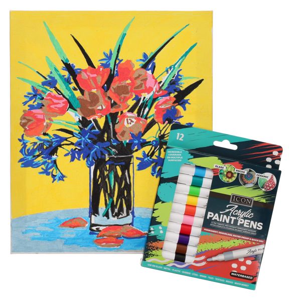 Box of 12 vibrant acrylic paint pens next to a finished painting of red and blue flowers on a yellow background.