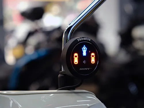 INNOVV ThirdEYE motorcycle BSD Watch Version watch alert display with glowing warning lights mounted on motorcycle handlebar