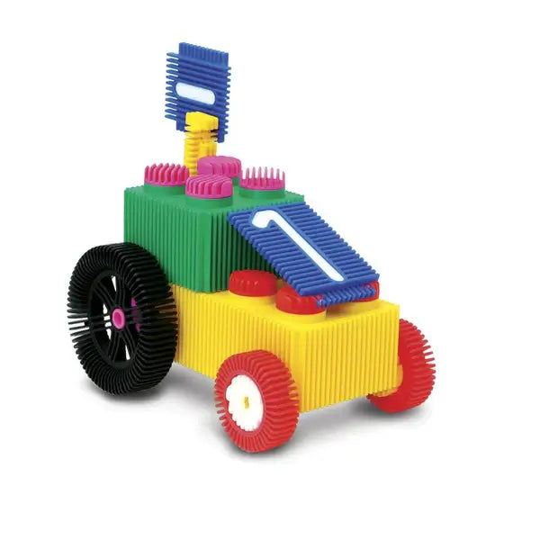 Toy tractor made of yellow, green, and blue ridged interlocking plastic pieces with black and red wheels.