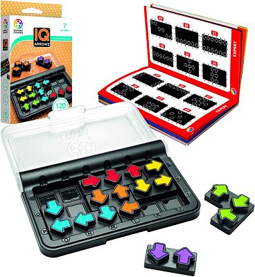 Vibrant arrow puzzle pieces on a black board, with an open challenge booklet and product box.
