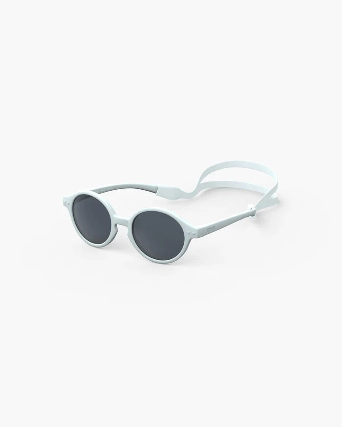 Light blue round baby sunglasses featuring dark lenses and a matching adjustable silicone head strap.