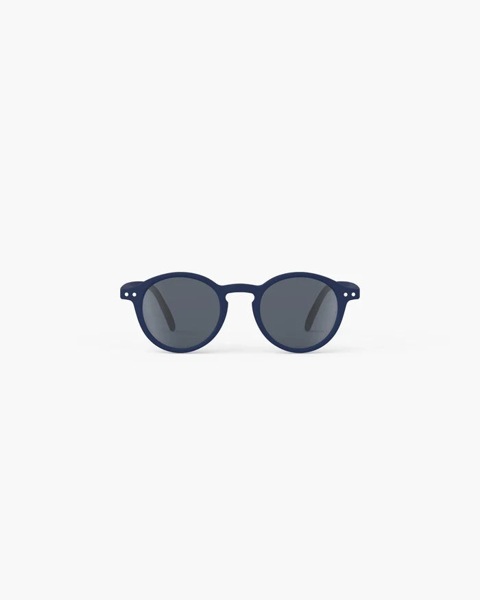 Round navy blue matte sunglasses for kids with dark grey lenses and silver pin accents.