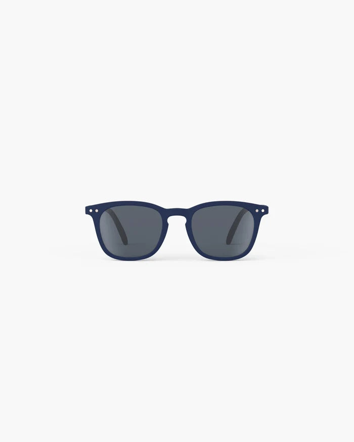 Navy blue wayfarer sunglasses with dark grey lenses and silver dot details on the corners.