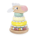 Wooden stacking sheep with pastel rings, white felt dividers, and a clear rattle base with colorful beads.