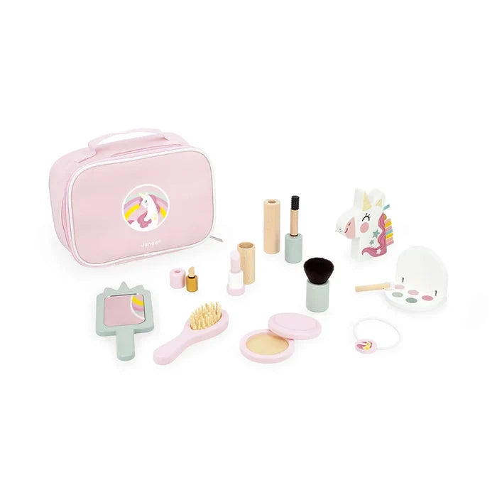 Pink unicorn vanity bag with a wooden toy makeup set featuring a mirror, brush, and palette in soft pastel colors.