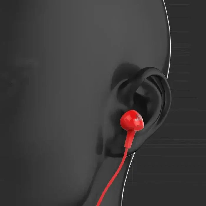 Side view of mannequin wearing JBL C100SI In-Ear Wired Stereo Headphones in red color