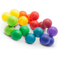 A flexible chain of smooth, multi-colored plastic balls in rainbow shades, linked together on a white background.