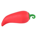 A bright red chili pepper-shaped squishy toy with a curled green stem on a plain white background.