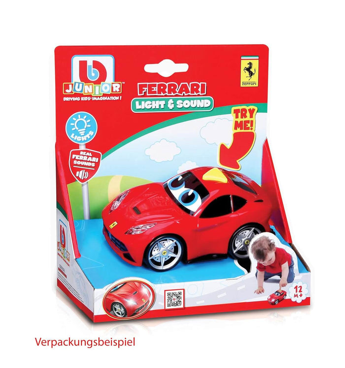 Red toy car with cartoon eyes in its red and white packaging featuring a Ferrari logo and a Try Me! arrow.