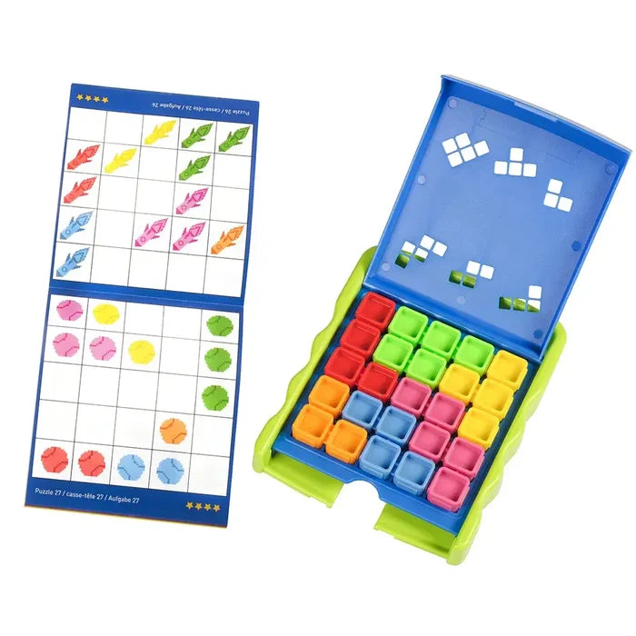 Logic puzzle game featuring colorful square tiles in a green and blue case next to an illustrated challenge booklet.