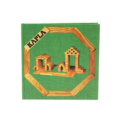 Green fabric-textured book cover with an octagonal wooden frame around a photo of wooden plank building structures.