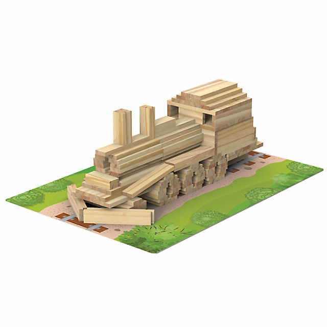 Steam engine model built from light wood planks on a green illustrated landscape mat with railroad tracks.