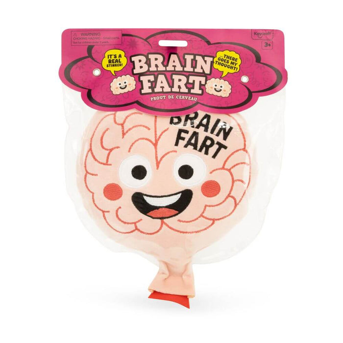 Pink brain-shaped whoopee cushion with a smiling cartoon face and bold text, shown in its retail header packaging.