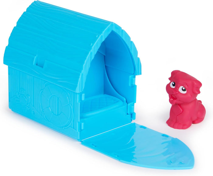 Blue plastic doghouse with wood grain texture and open front door next to a small bright pink puppy figurine.