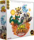 Board game box for King of Tokyo Origins featuring four monsters battling over a crystal city on a white background.