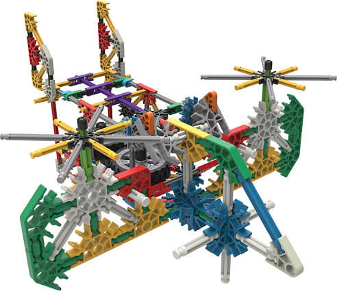 Intricate toy aircraft model built from colorful plastic rods, star-shaped connectors, and gear pieces.