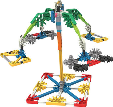 K'NEX carnival swing ride model with a tall orange center pole, four green arms, and hanging colorful swing seats.