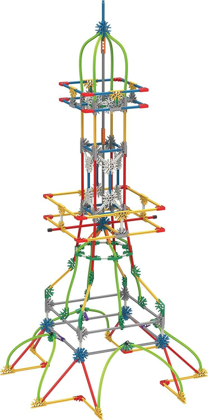Tall Eiffel Tower model built with colorful red, yellow, and green plastic construction rods and connectors.