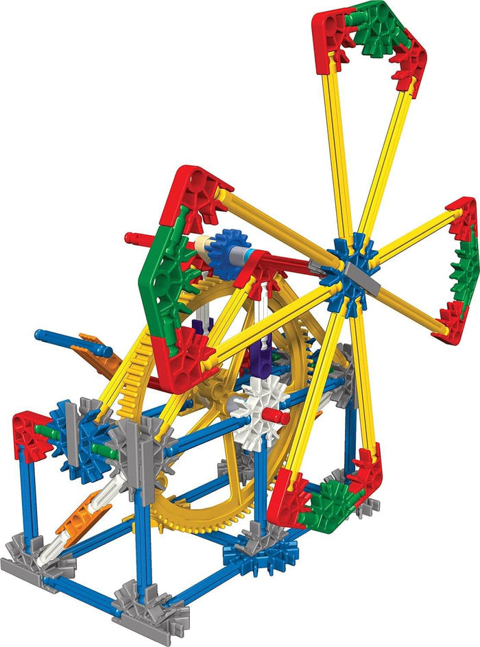 Colorful K'NEX gear system model featuring yellow rods, blue connectors, a large central gear, and a windmill.