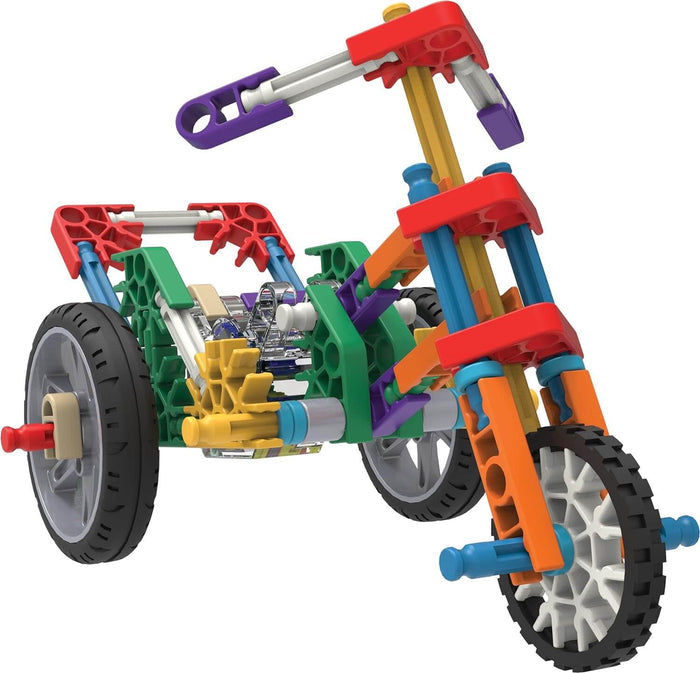 Colorful three-wheeled toy vehicle built from red, blue, green, and orange K'NEX rods and connectors.